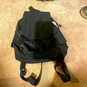 Kipling black backpack never used no rips no stains in perfect condition!